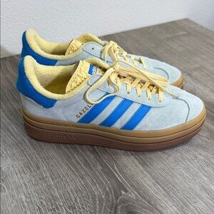 Adidas Sneakers with Blue Stripes and Yellow Accents